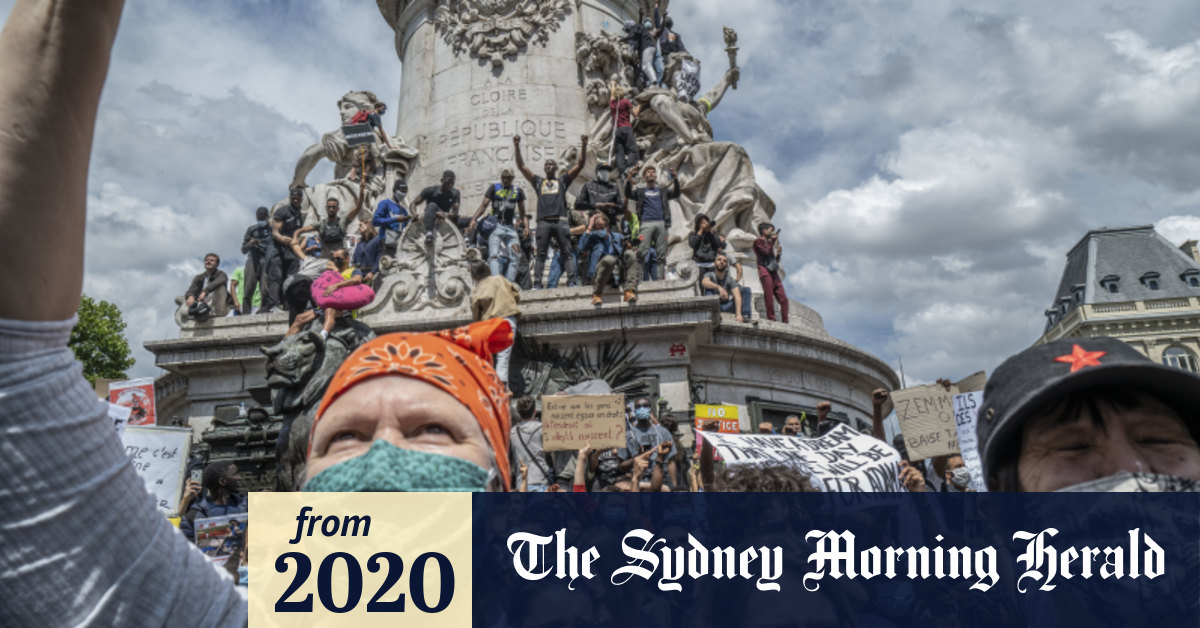 Macron says France won't remove statues, erase history